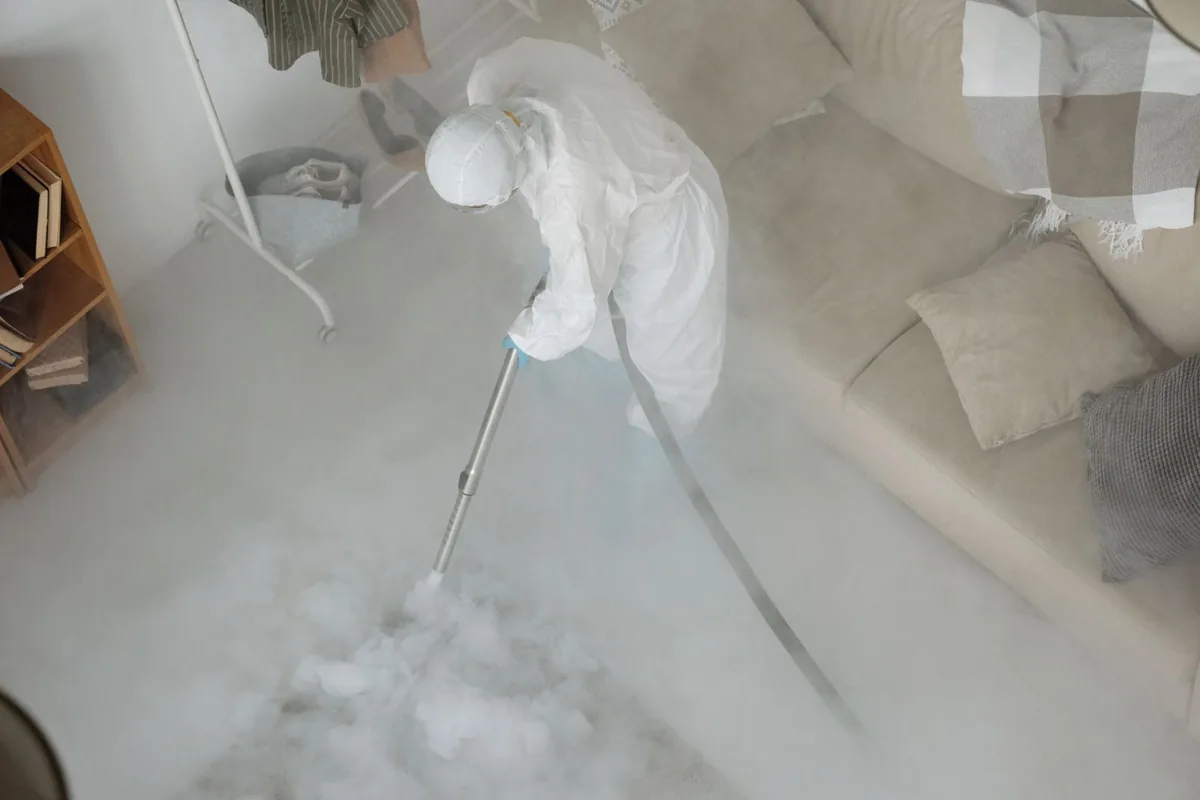 Biohazard cleanup technician in protective equipment, Garfield, NJ